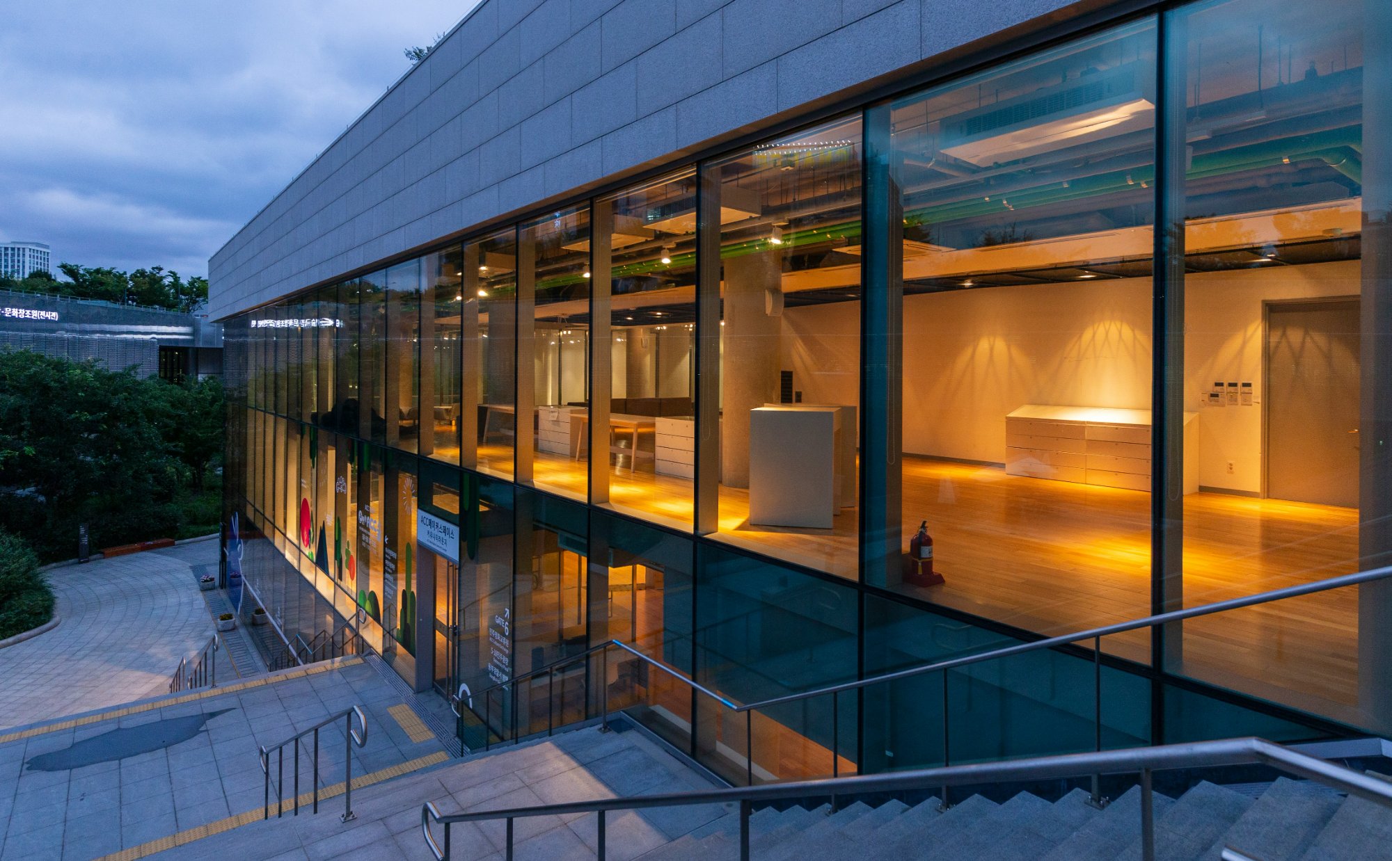 Glass building facade at dusk