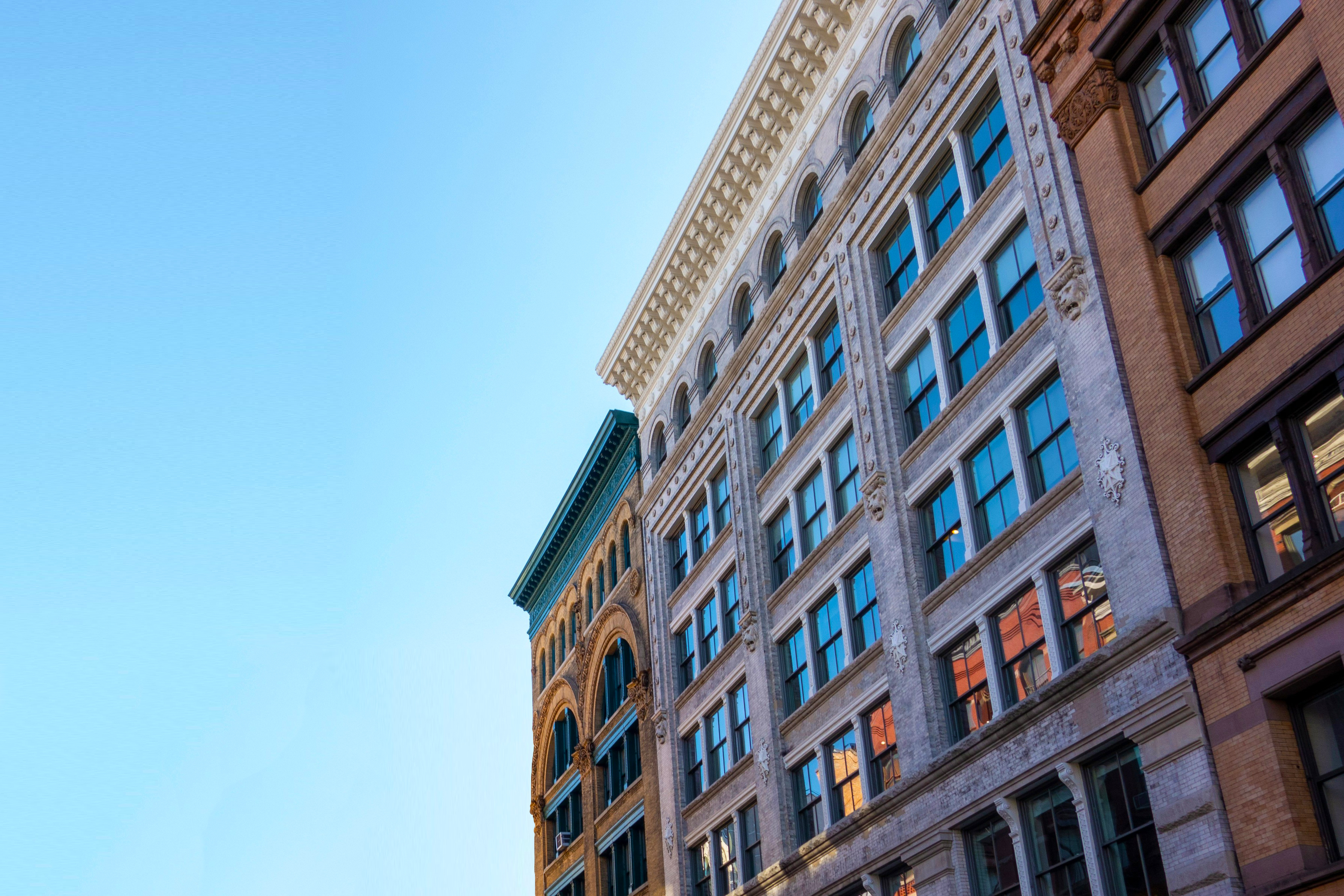 NYC building facades with detailed window work, Manhattan